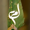 Gold-splattered green quill feather showing the metallic glitter paint