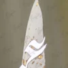 Close-up of the ornate gold handle and clear faceted crystal gemstone