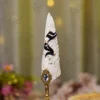 Custom silver mirror acrylic Urdu nameplate mounted on the white feather