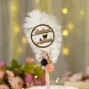 Elegant floral themed wedding signing pen lying on a soft white fur backdrop