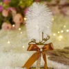 Side angle of the bronze ribbon bow with pearl and rhinestone button centerpiece