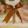 Elegant signing pen lying on a soft cream background for Nikkah setups