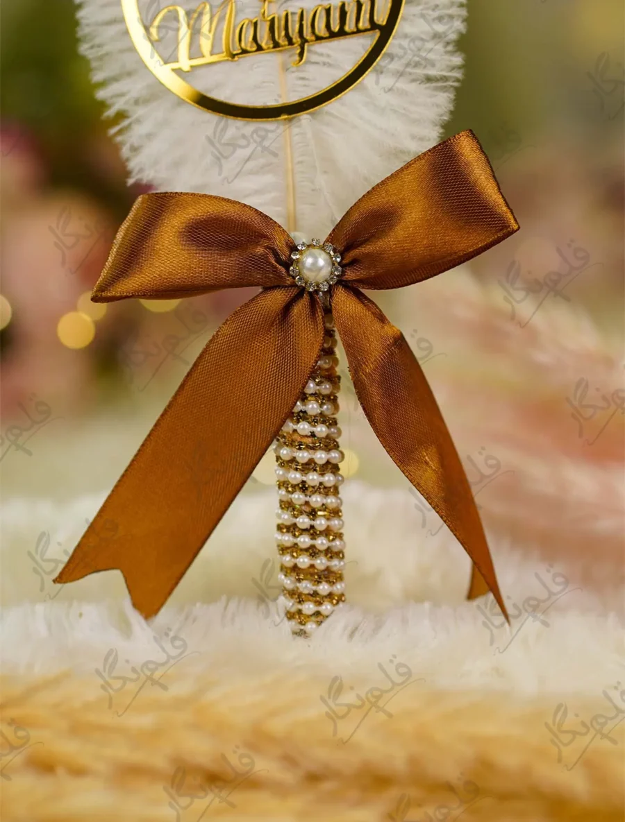 Elegant signing pen lying on a soft cream background for Nikkah setups