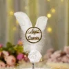 Side angle of the white satin rose and silver wrapped pen handle