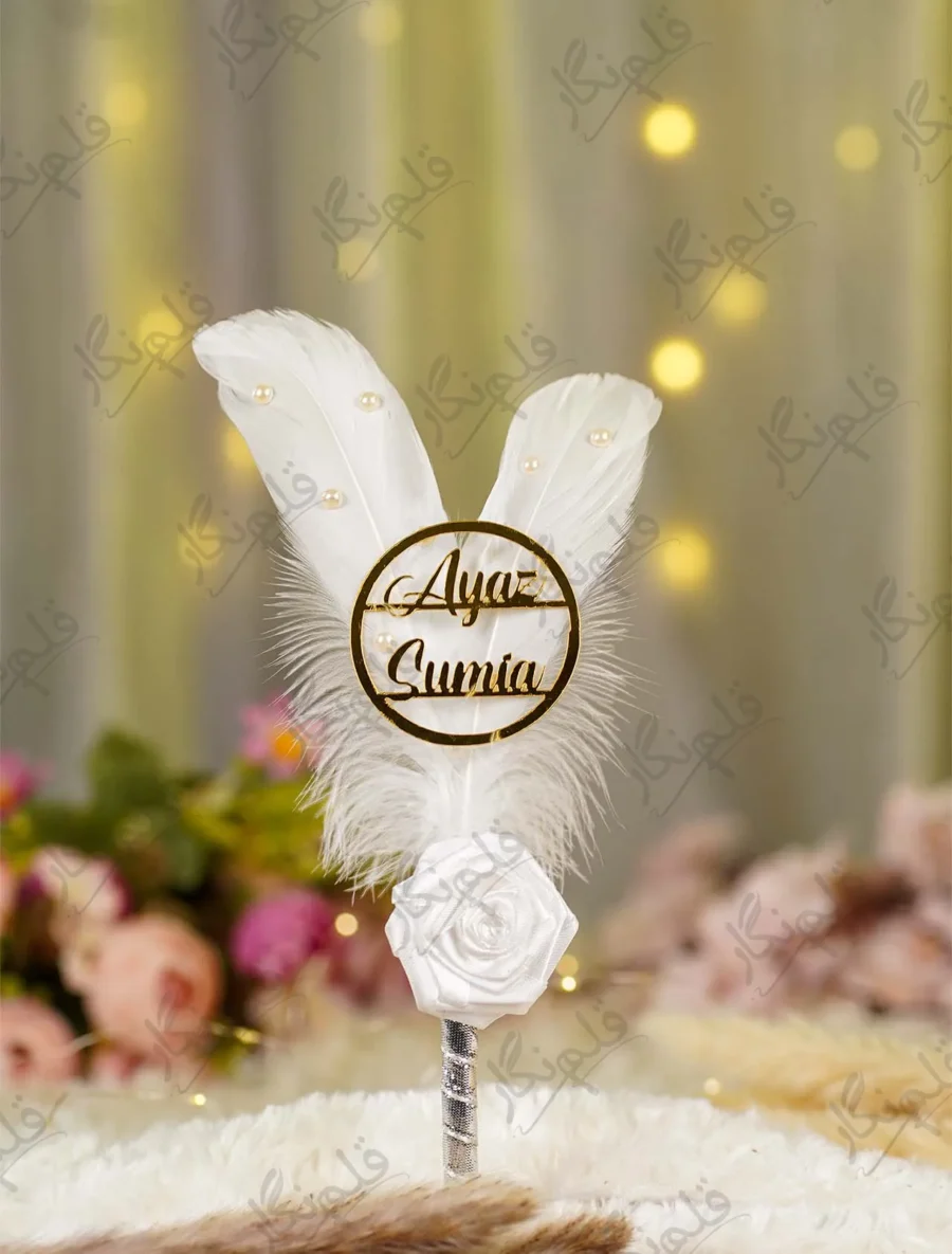Side angle of the white satin rose and silver wrapped pen handle