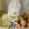 Detailed shot of the silver ribbon bow with square rhinestone centerpiece