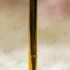 Close up of the clear crystal diamond gem in a gold prong setting