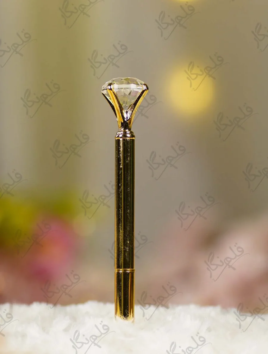Gold metal Nikkah pen topped with a large clear crystal diamond gem and gold nameplate