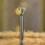 Silver metal Nikkah pen topped with a large clear crystal diamond gem