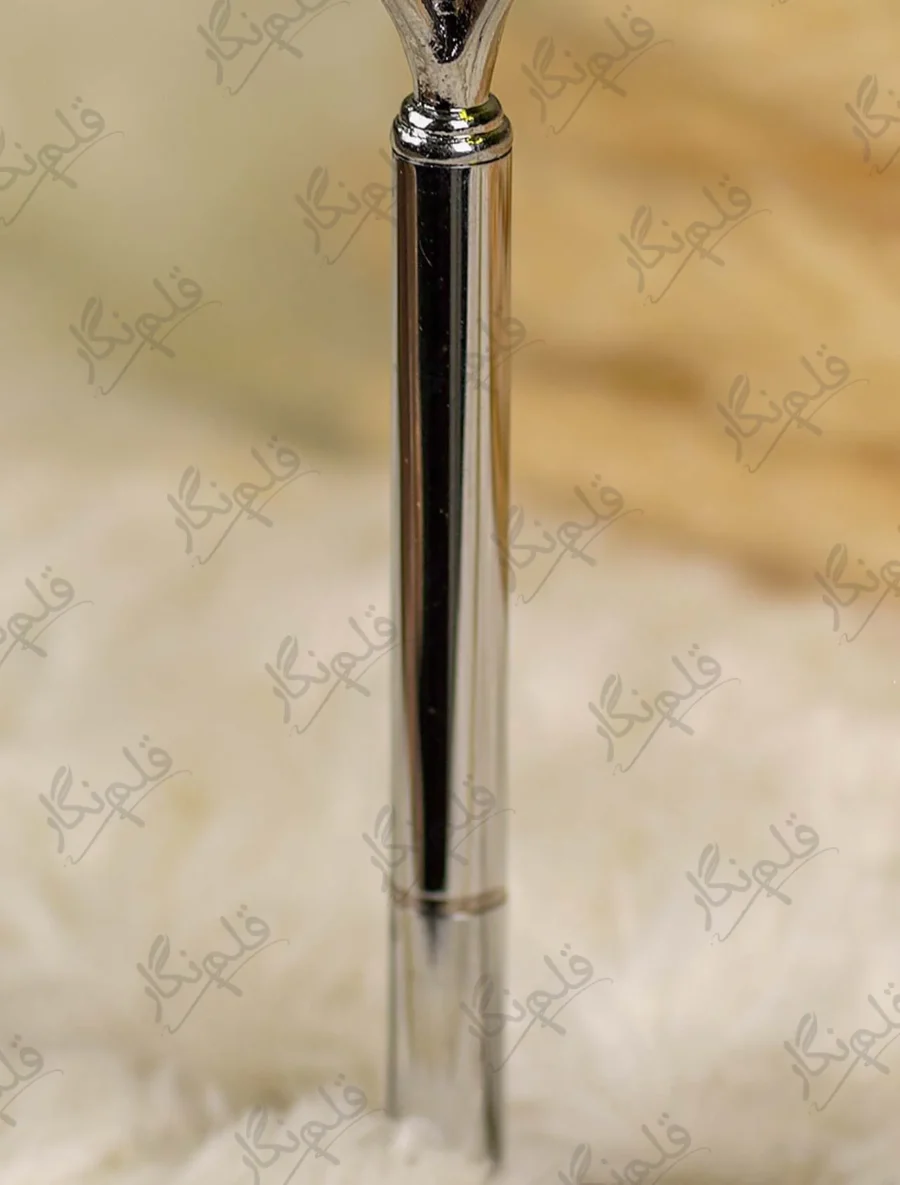 Customized version showing a gold mirror acrylic name cutout mounted on the silver pen