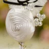 High angle close up of the soft white feather quill