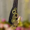 Full length view of Black Gold Splatter Steampunk Feather Nikkah Pen with gold metal handle