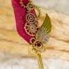 Red feather Nikkah pen featuring a gold mirror acrylic Bismillah calligraphy cutout at the top
