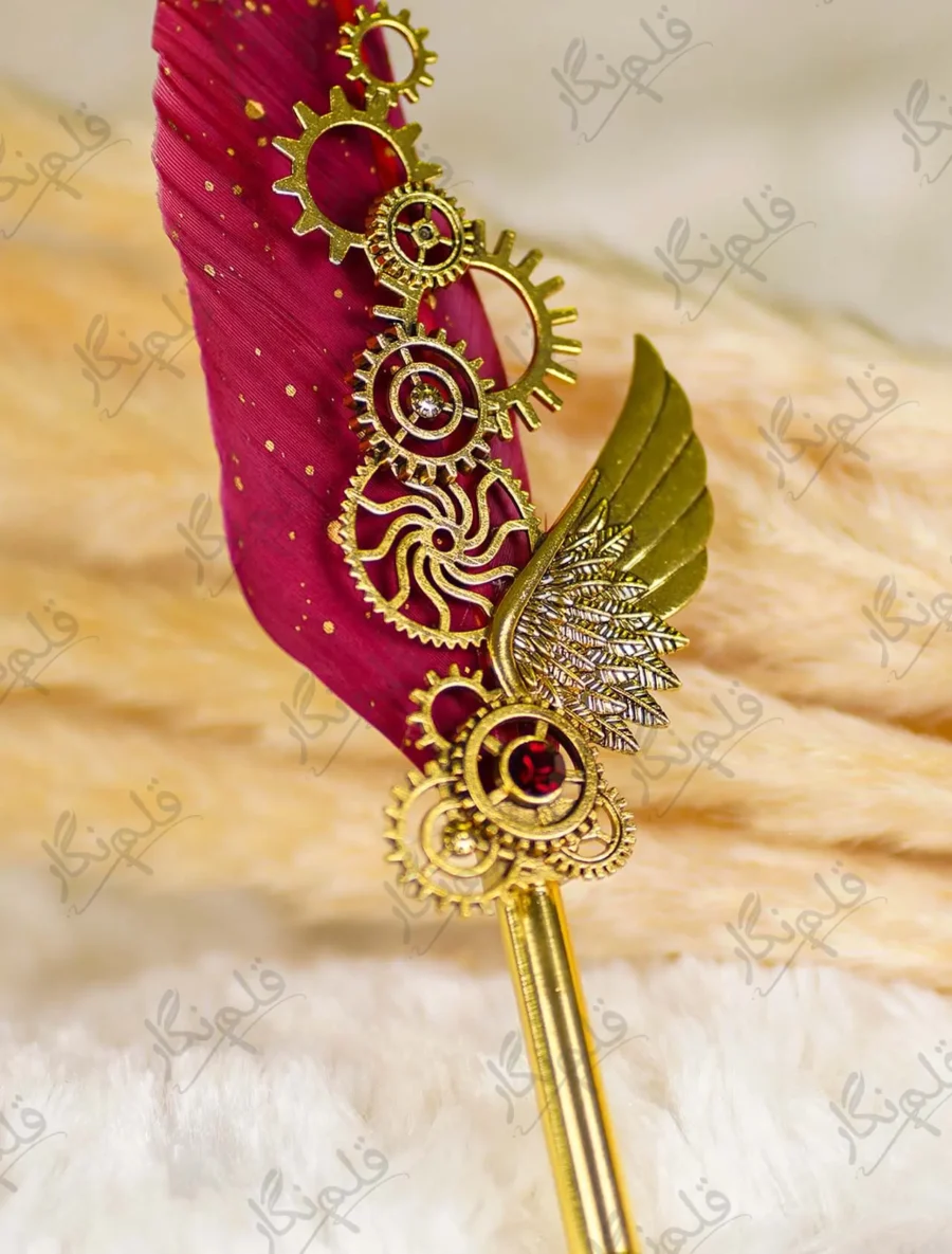 Red feather Nikkah pen featuring a gold mirror acrylic Bismillah calligraphy cutout at the top