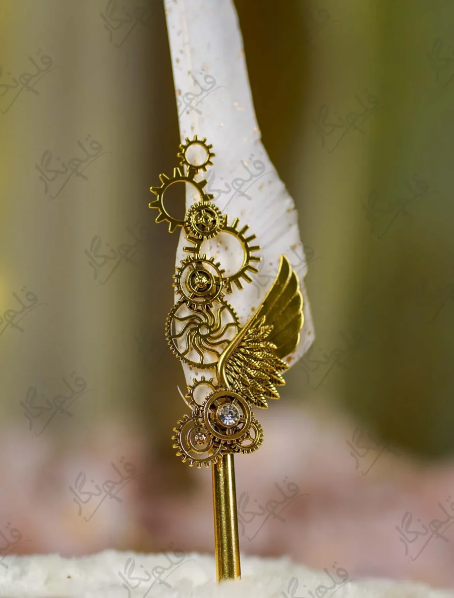 Detailed view of clear rhinestone set inside the gold gear of the Nikkah pen