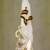 Side angle of the gold gears and wing assembly on white wedding pen