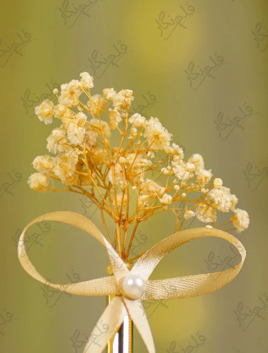 Gold metal Nikkah pen with dried yellow baby's breath flowers and champagne ribbon