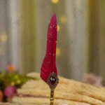 Gold steampunk Nikkah pen with red feather and large red crystal gem