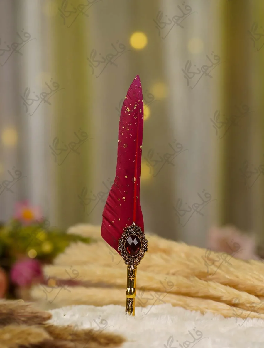 Gold steampunk Nikkah pen with red feather and large red crystal gem