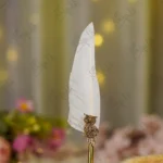 Imported gold metal owl Nikkah pen with a white quill feather