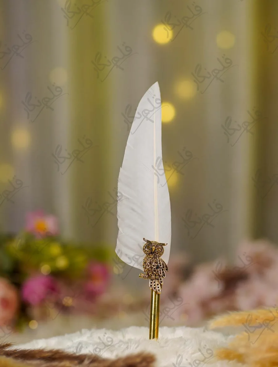 Imported gold metal owl Nikkah pen with a white quill feather