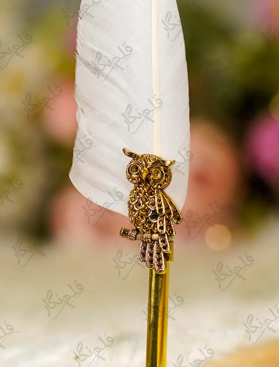 Close up of the golden owl claw detail grasping the branch on the metal shaft