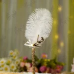 Handmade white feather Nikkah pen with gold ribbon handle and gold Qabool Hai script