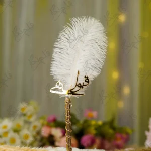 Handmade white feather Nikkah pen with gold ribbon handle and gold Qabool Hai script