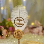 Handmade white feather Nikkah pen with a gold satin rose and rhinestone spine