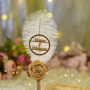 Handmade white feather Nikkah pen with a gold satin rose and rhinestone spine