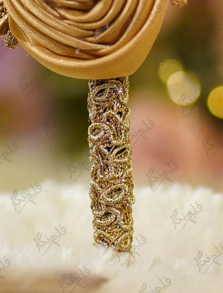 High angle close up of the personalized wedding nameplate and rhinestones