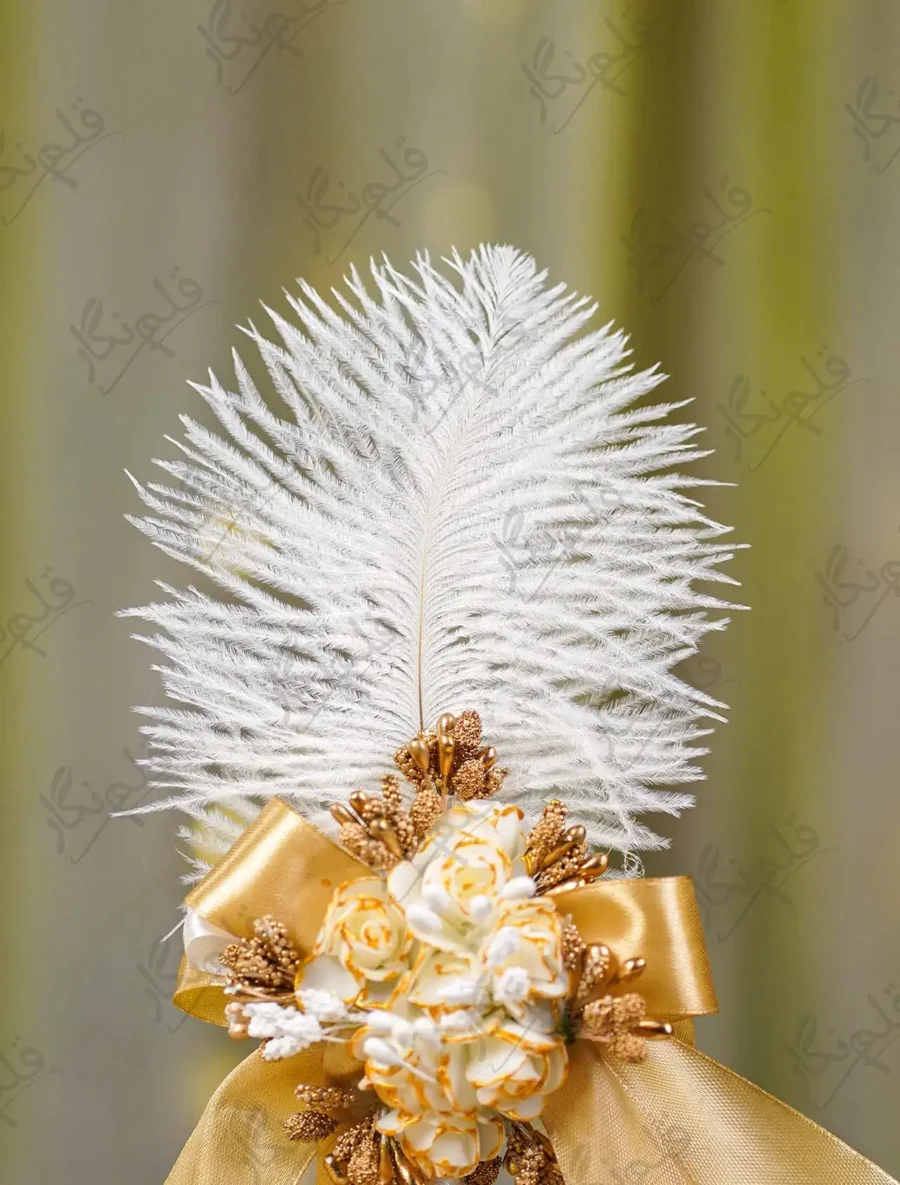White satin ribbon-wrapped stem showing the gold glitter spiral overlay