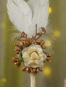 Golden beaded stamen sprigs and ivory wrapped pen handle close up