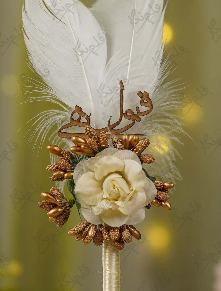 Golden beaded stamen sprigs and ivory wrapped pen handle close up
