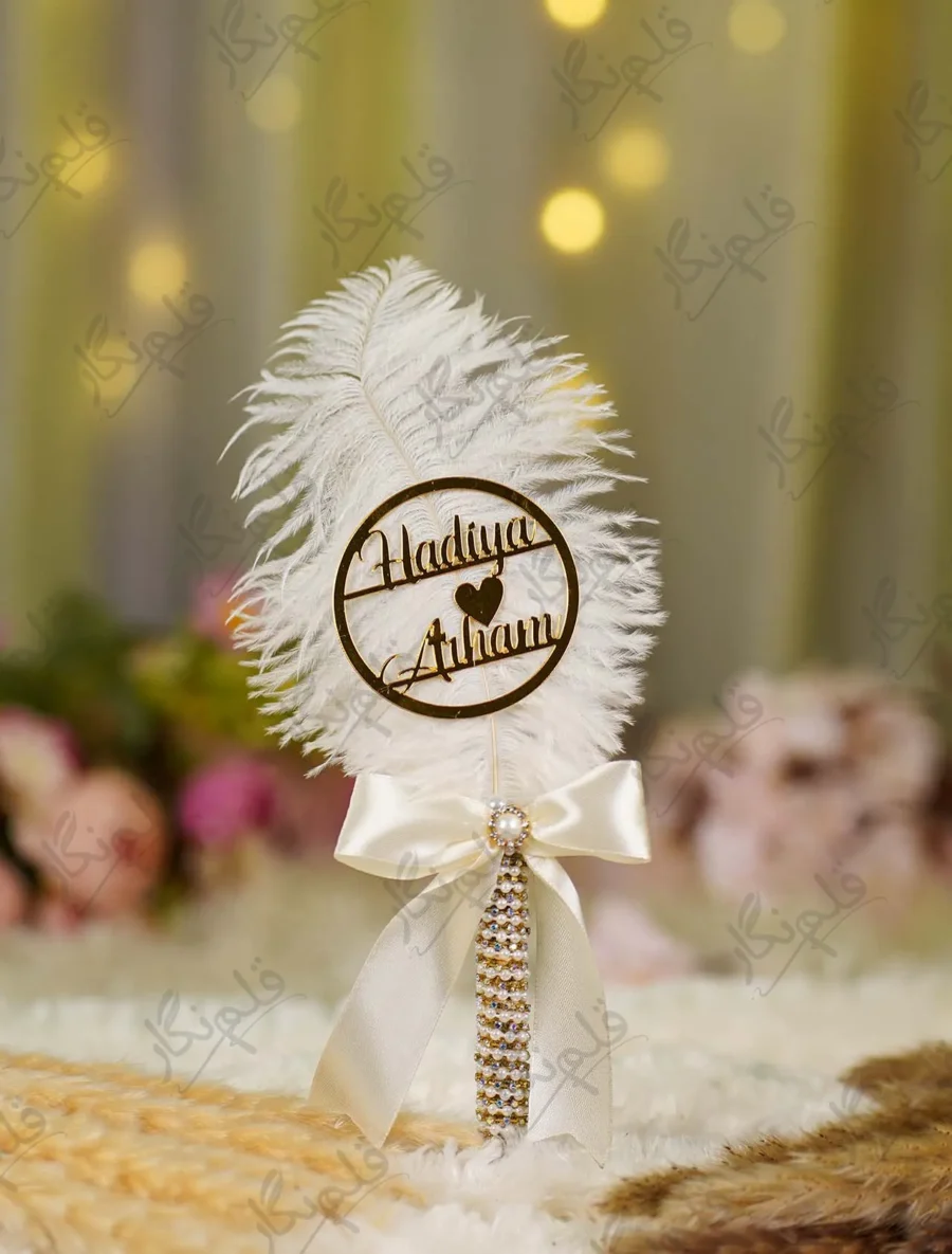 Detailed shot of the vertical white pearl and rhinestone lines on the gold mesh handle