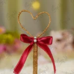 Handmade rustic Nikkah pen with a jute heart frame and maroon bow