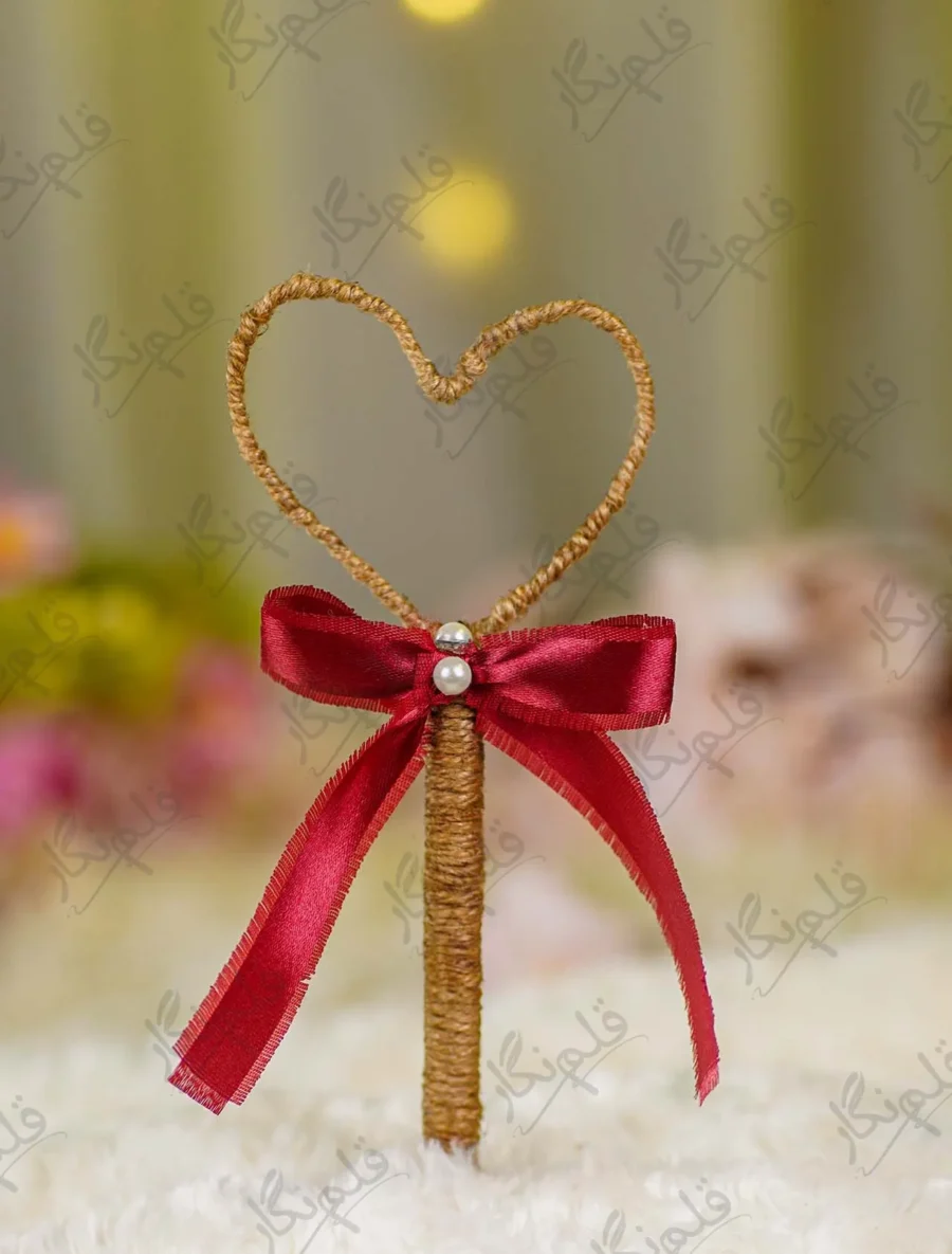 Handmade rustic Nikkah pen with a jute heart frame and maroon bow