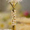 Close up showing the custom name circle option on the white feather