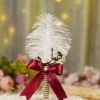 Gold pearl mesh Nikkah pen with maroon bow and white feather