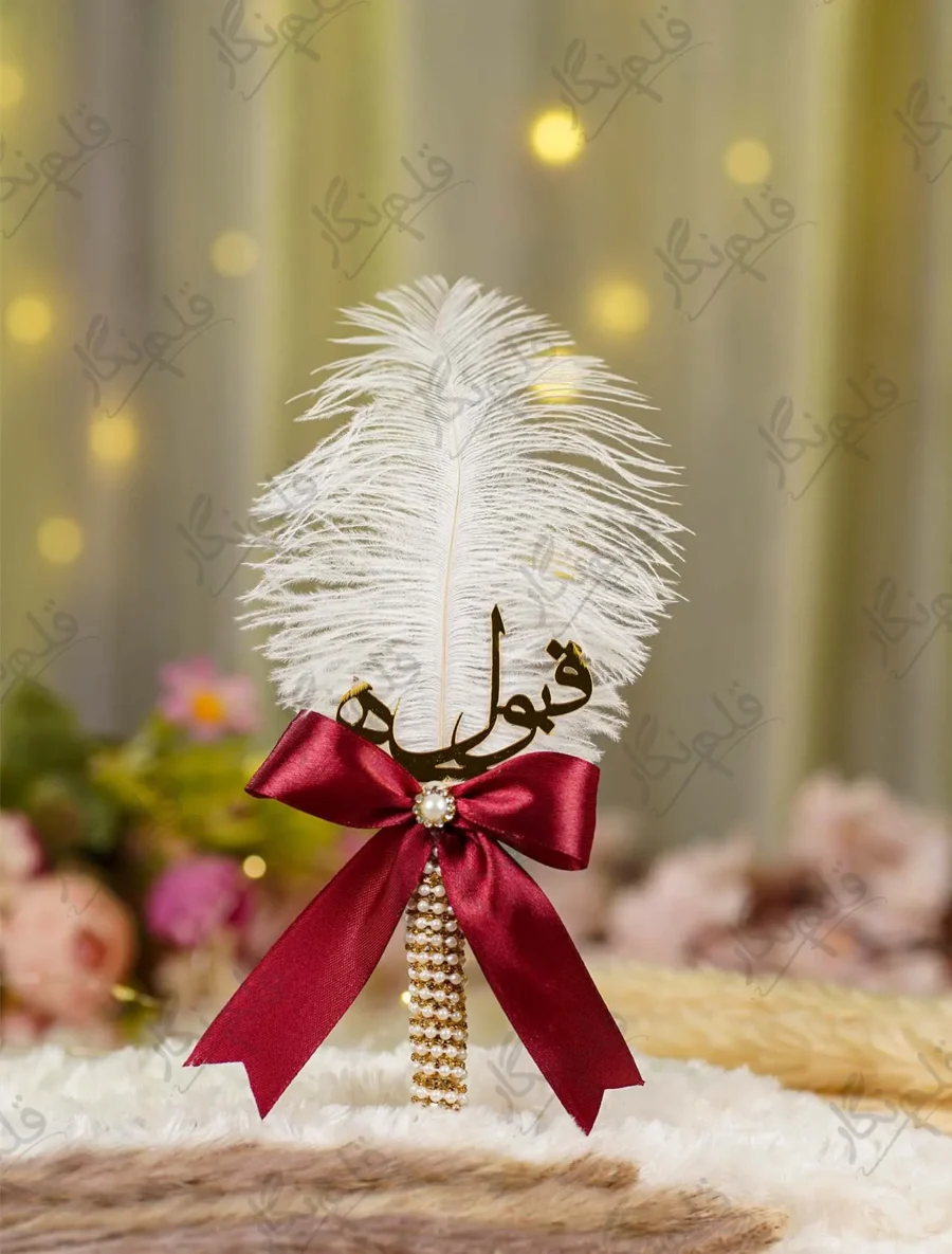Gold pearl mesh Nikkah pen with maroon bow and white feather