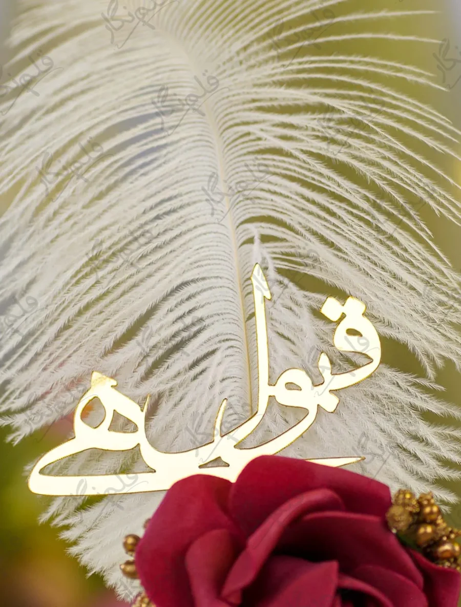 Detailed shot of the maroon and white foam roses with gold stamens