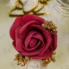Detailed close up of the handle wrapped in textured metallic gold lace ribbon