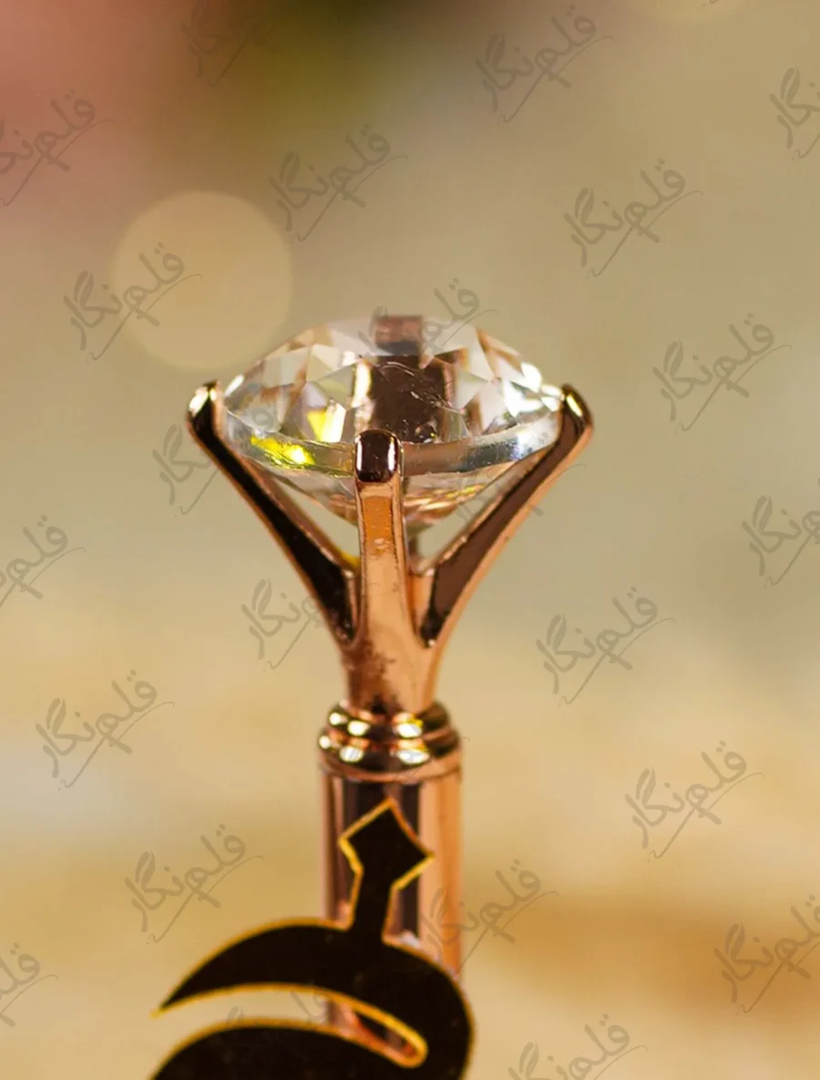 Faceted clear crystal glass diamond top in rose gold crown-prong setting
