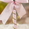 Elegant pink themed wedding signing pen lying on a soft white fur backdrop