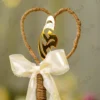 Elegant rustic wedding signing pen lying on a soft cream fur background