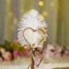 Handmade white feather Nikkah pen with a jute heart and pink flowers