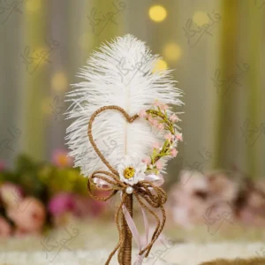 Handmade white feather Nikkah pen with a jute heart and pink flowers