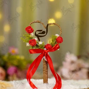 Handmade rustic Nikkah pen with a jute heart and red rose wreath