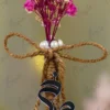 Detailed shot showing the brown jute twine bow and wrap construction
