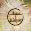 Customized version showing circular gold acrylic couple name circle on the feather